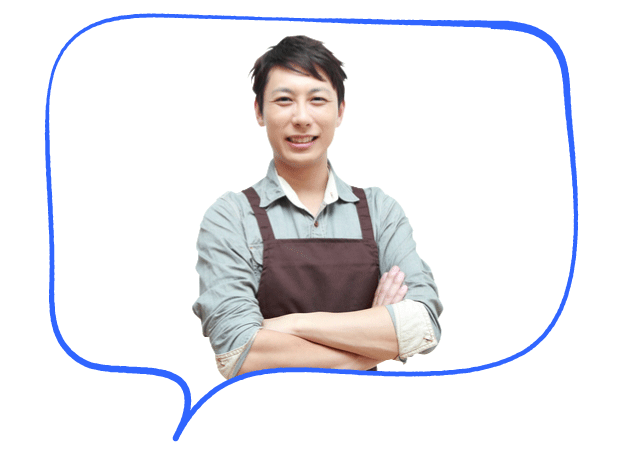 エプロンをして家事をしようとしている男性
